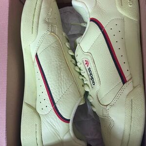 Adidas Men's Light Green Sneakers with Red and Blue Accents